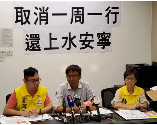 劉其烽(左)、譚凱邦(中)。