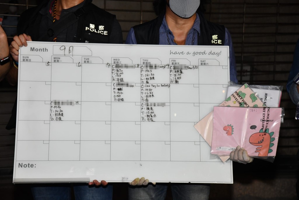 證物包括各成員分工表。徐裕民攝