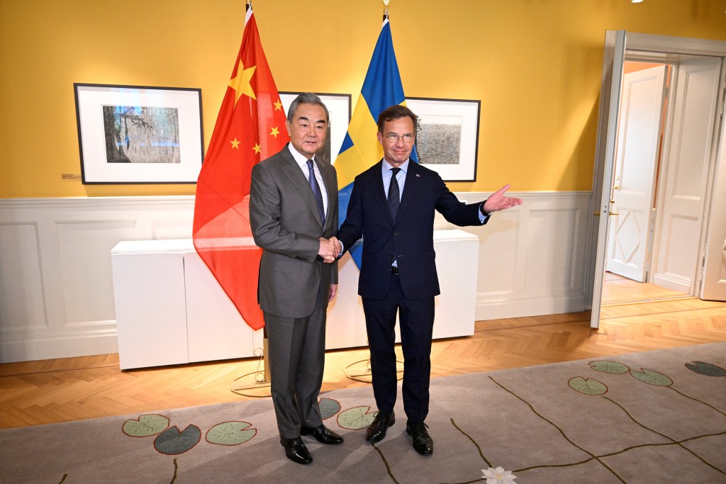 王毅與瑞典首相會晤 願與瑞典發揮互補優勢 促進互利合作。路透社