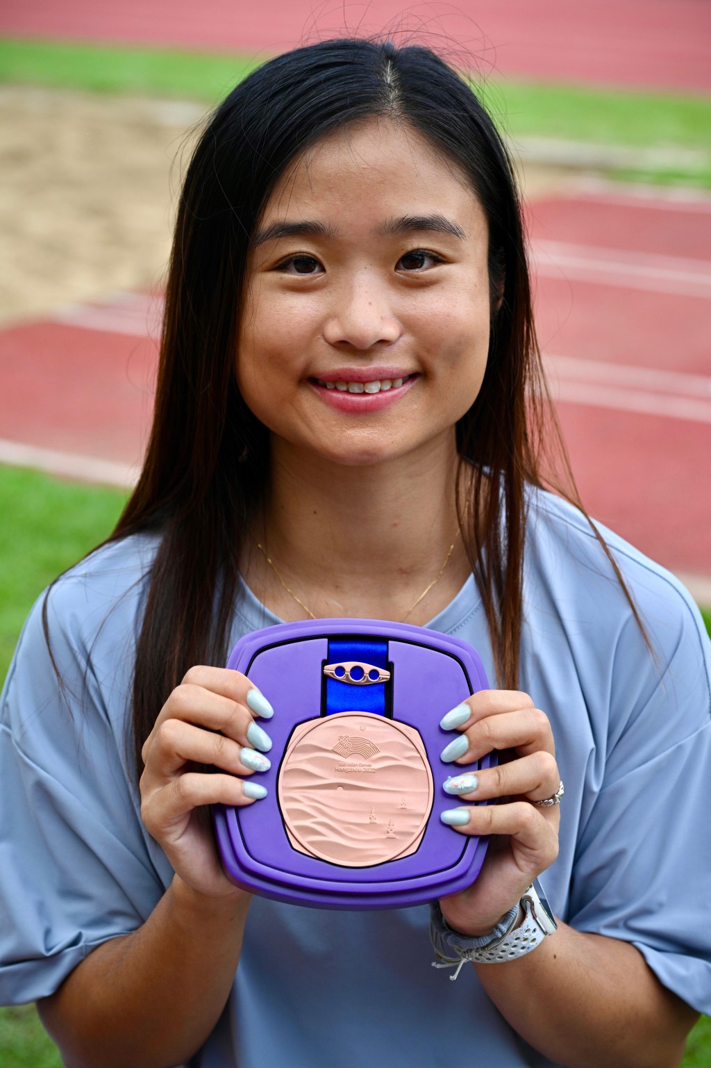 這面亞運銅牌難能可貴。蘇正謙攝