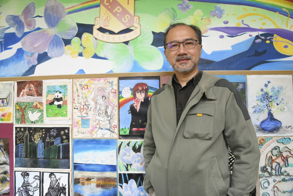 香港美術教育協會副會長梁崇任