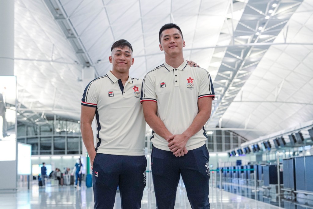 金牛隊的兩名香港代表梁兆華（左）及楊睿騏。