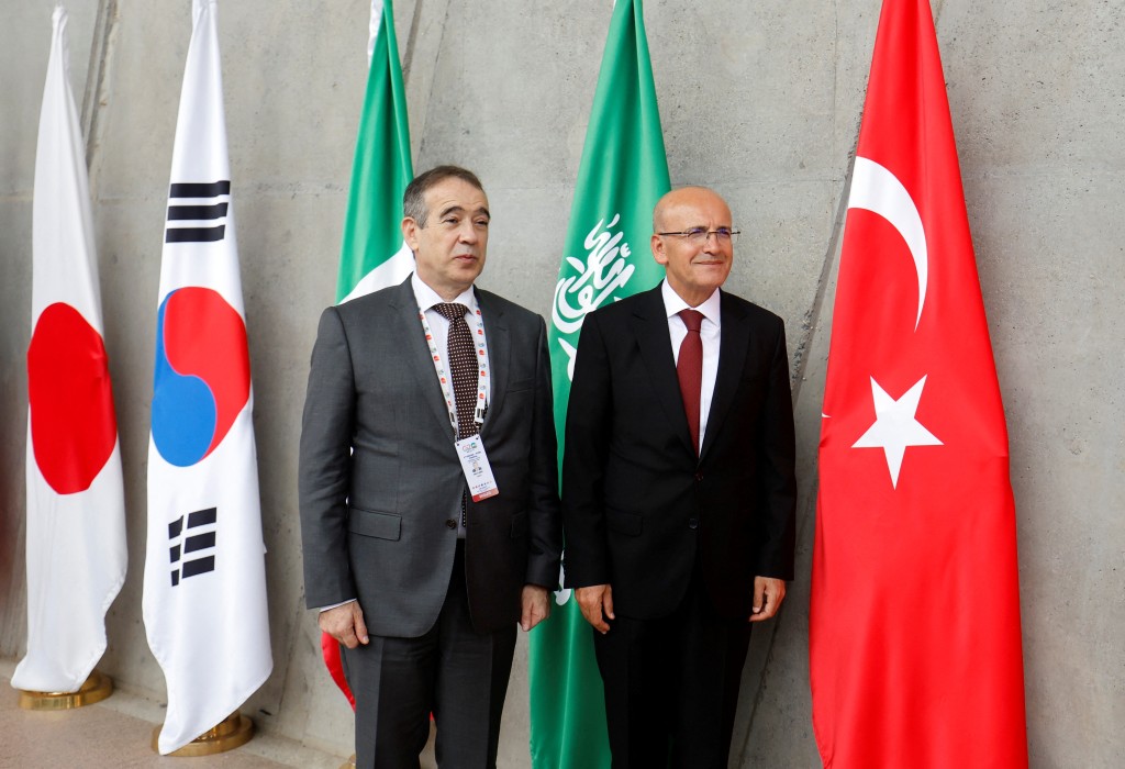 土耳其财长希姆塞克出席G20峰会。  路透社