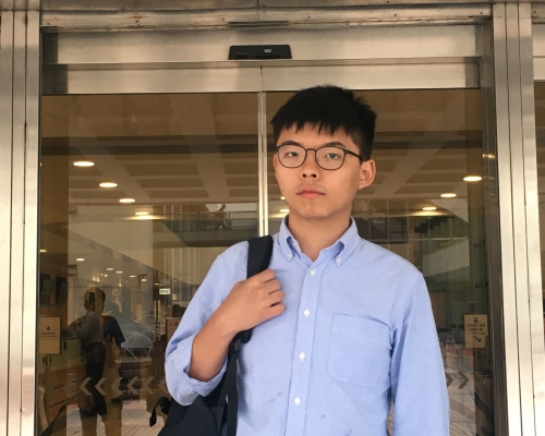 黃之鋒被控參與未經批准集結,本月30日東區法院提堂。 資料圖片