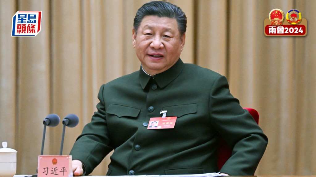 國家主席習近平今日出席兩會解放軍和武警部隊代表團全體會議。(新華社)
