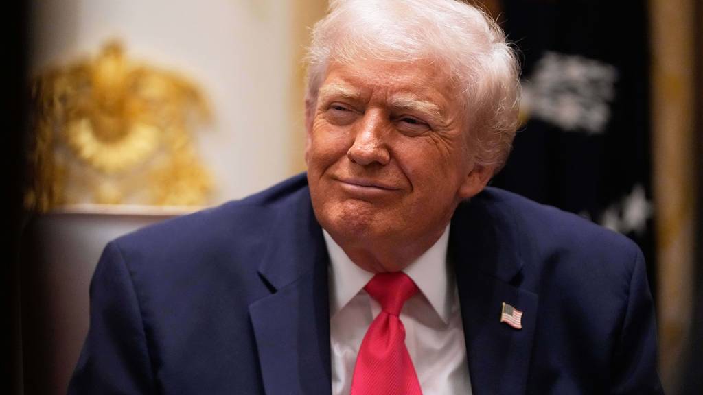 特朗普簽署後，《台灣保證實施法》正式生效。 美聯社