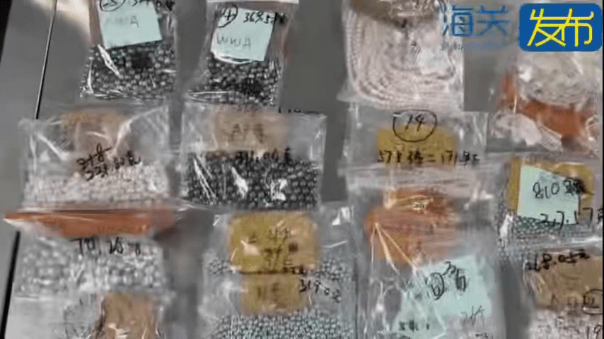  电动单车暗藏珍珠，黑衣女沙头角口岸闯关被截，1.2万粒市值¥273万。