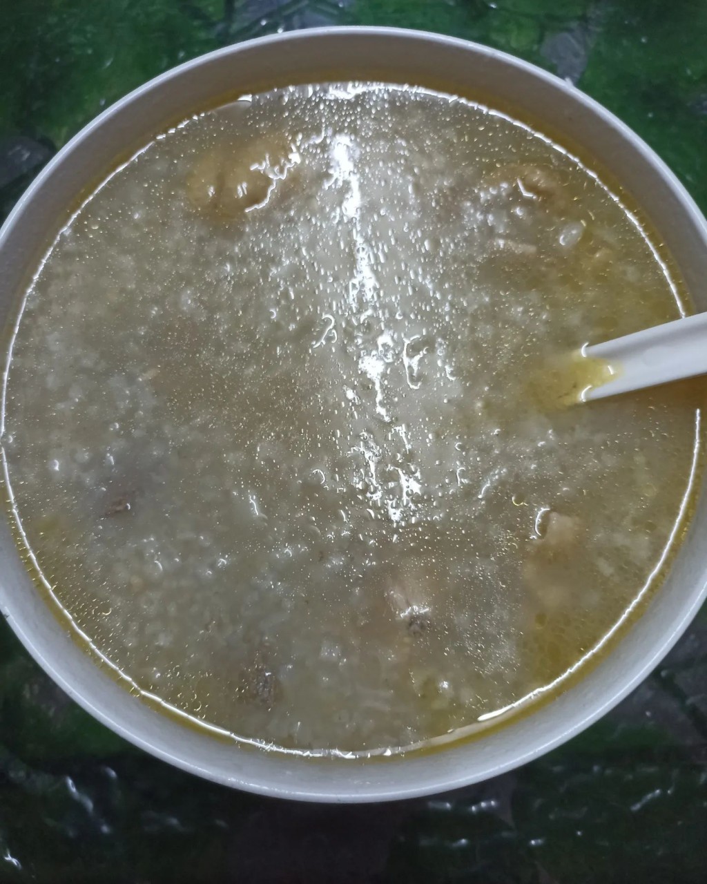 呢碗係豬潤雞粥,稀到呢。