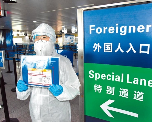 下周一起允許持三類有效居留許可外國人可入境中國。 新華社圖片