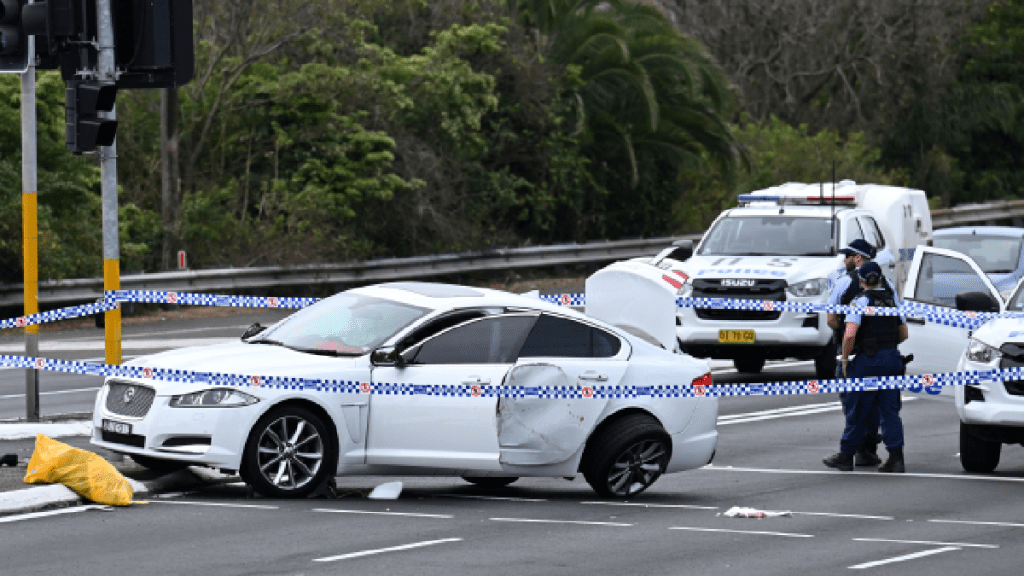 悉尼發生兩車相撞外加持刀傷人事故。(路透社)