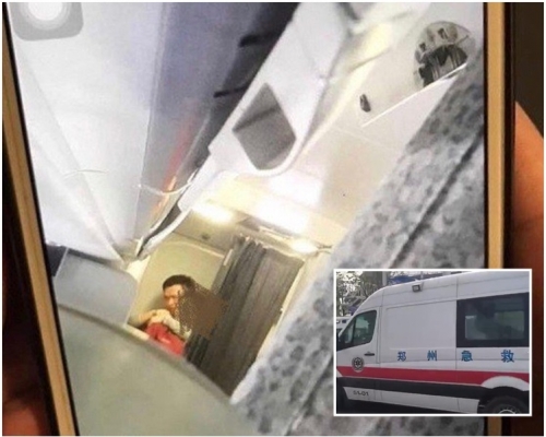 網上流傳一張相片見男子脅持空姐。網圖