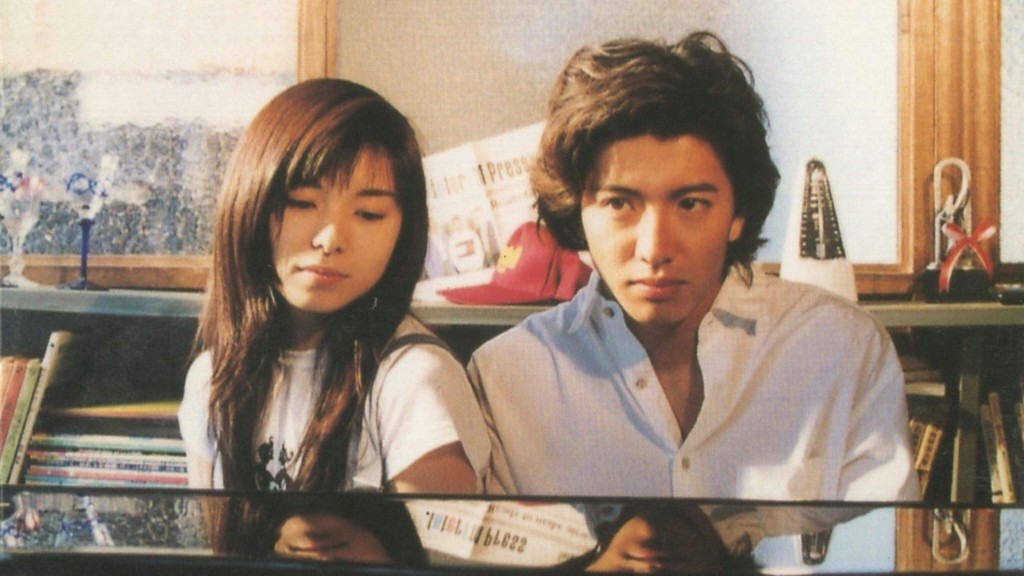 《悠長假期》一對主角木村拓哉和山口智子。