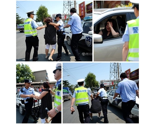女司機最後被警噴射辣椒水強制帶上警車。