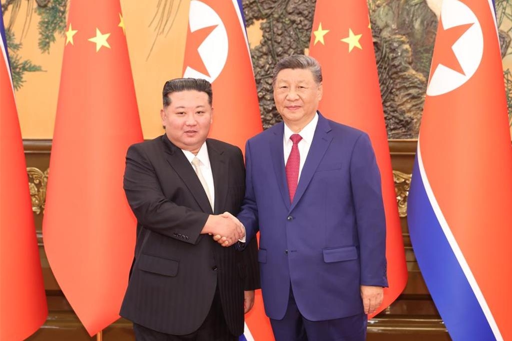 金正恩就國慶76周年向習近平致賀電。 中新社