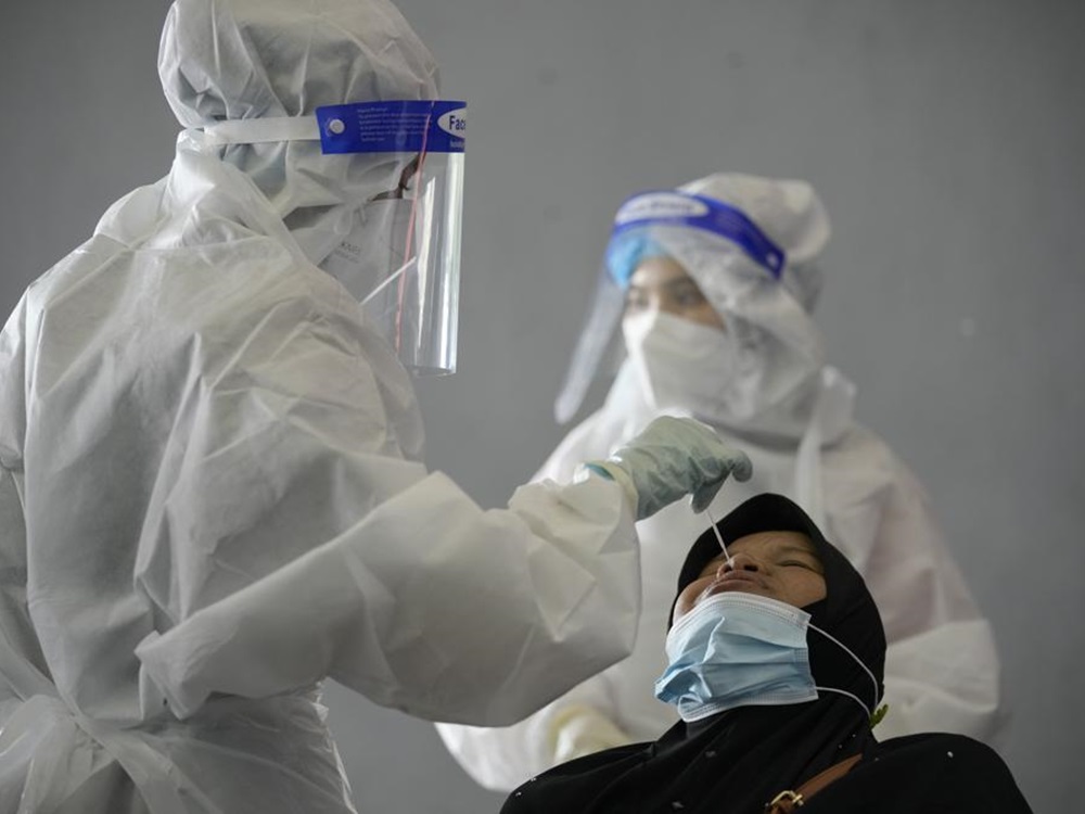 馬來西亞總理毛希丁宣布第一階段全面防疫封鎖措施將二度延長。美聯社資料圖片