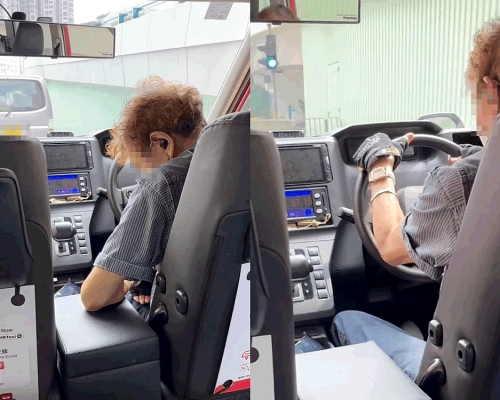 的哥疑开车睇片，懒理乘客提醒，一脸陶醉摇身打拍子。影片截图