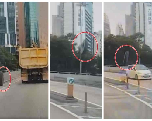 車轆滾向路中越過一輛私家車再飛墮橋底。fb