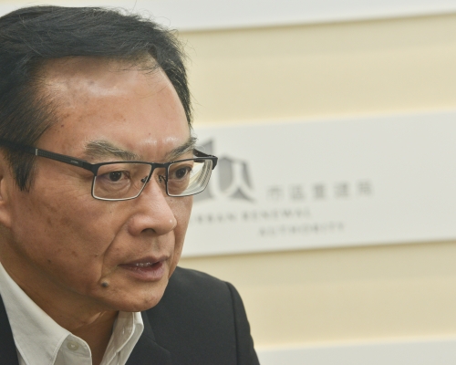 韋志成發表網誌解釋優化升降機計劃。資料圖片