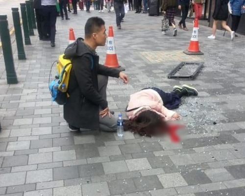 女傷者頭部重創昏迷倒地。John圖片