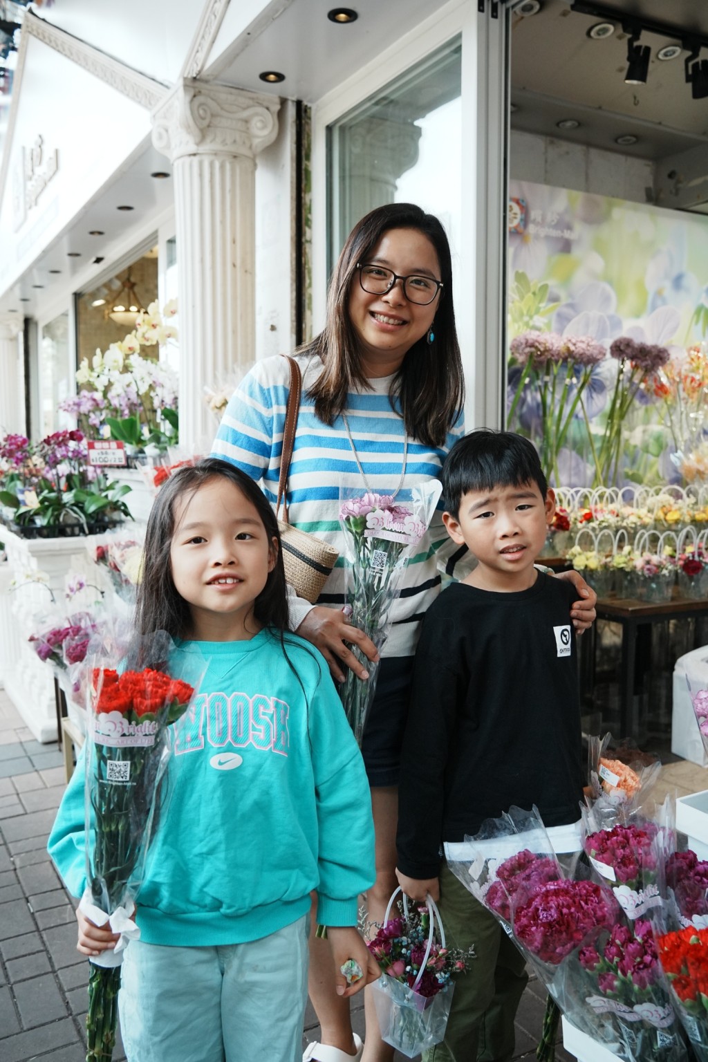 呂太與兩名子女。汪旭峰攝 呂太與兩名子女。汪旭峰攝
