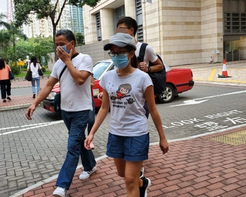 被告林曉樺（戴口罩女子）。蕭文軒攝
