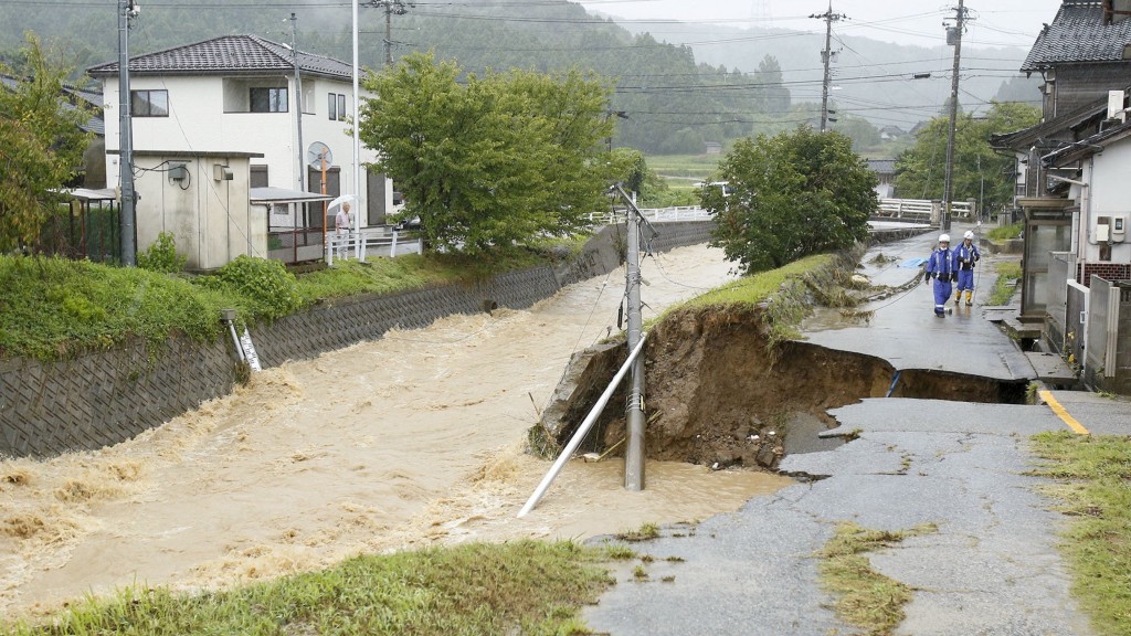 日本石川縣富山縣5級大雨，圖為石川縣羽咋市災情。 路透社