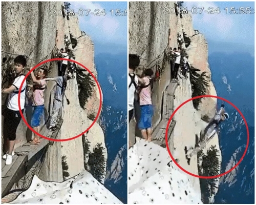 男遊客華山棧道中間位置時跳下山崖。片段截圖