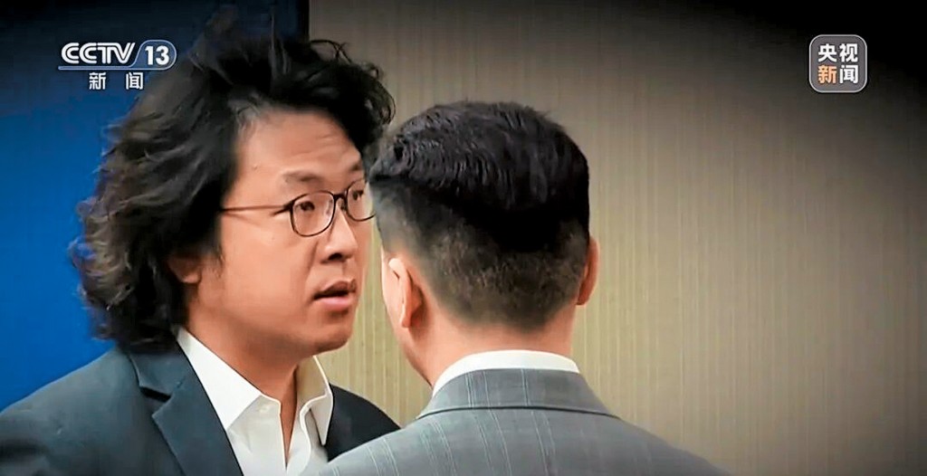 央视起底沈伯洋。