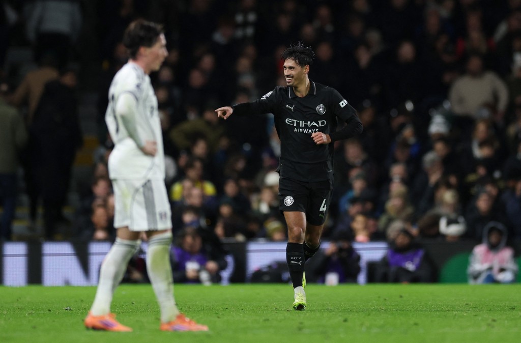 雷恩達射單刀挑射得手，曼城領先2:0。路透社