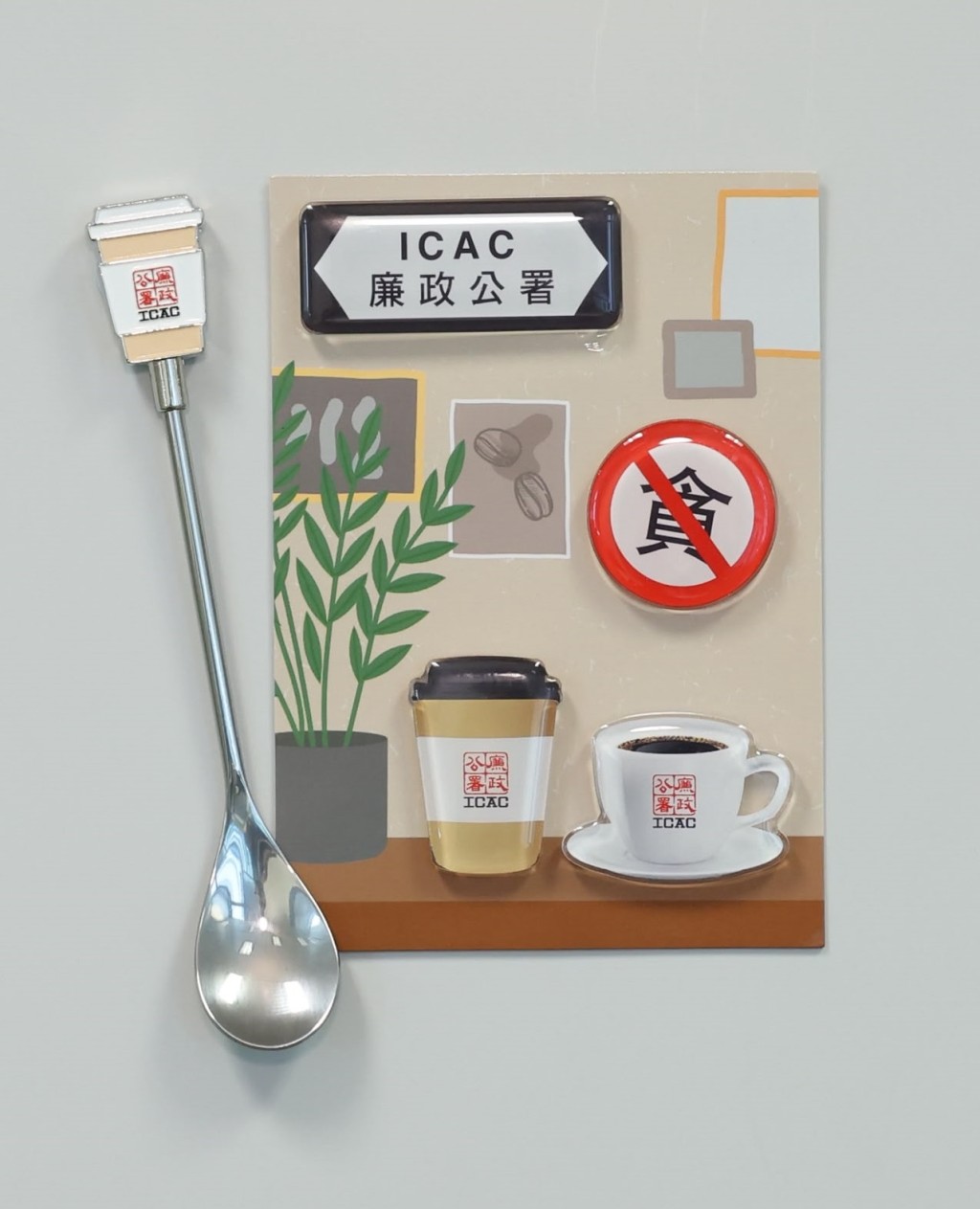 磁石冰箱貼及金屬咖啡匙。 磁石冰箱貼及金屬咖啡匙。