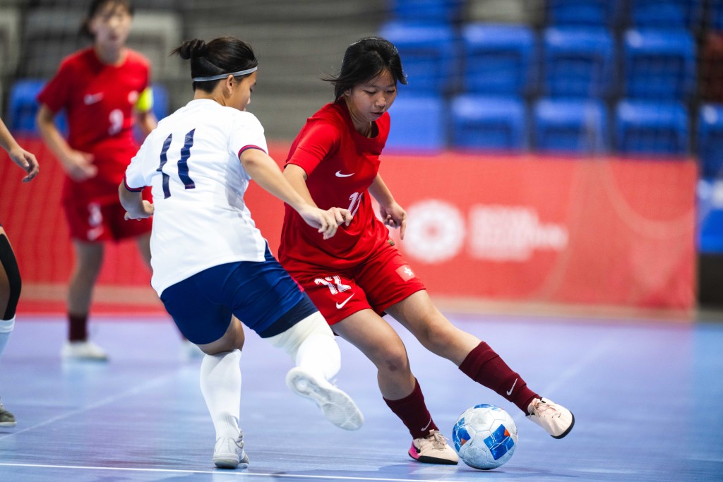 港女足(紅衫)於銅牌戰不敵中華台北。港協暨奧委會圖