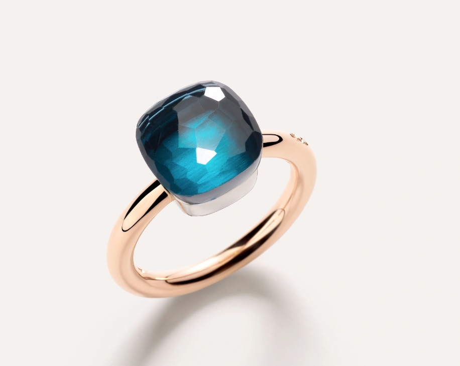 18K玫瑰金镶单颗天蓝色托帕石指环。（Pomellato）