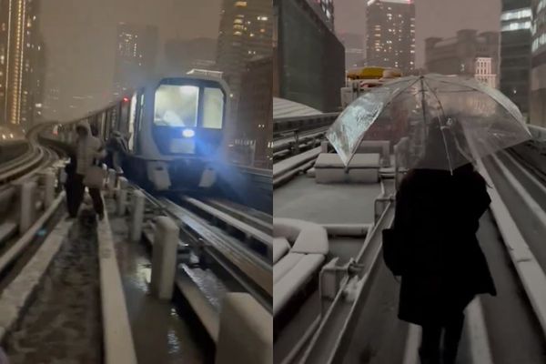 百合海鷗號2輛列車停駛，約550名乘客被迫在大雪中從軌道步行到汐留車站。X圖片