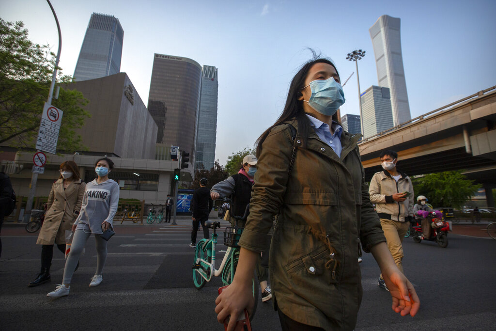 新冠肺炎在內地有緩和跡象,惟各地均仍不鬆懈。AP
