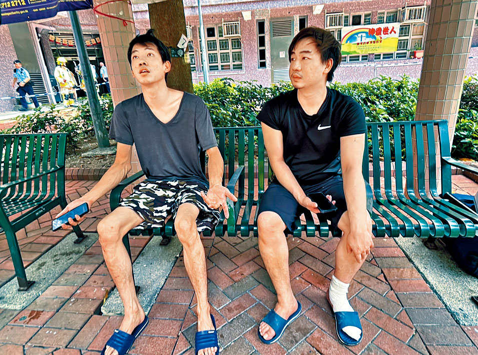 何氏兄弟講述爬窗逃生驚險過程。