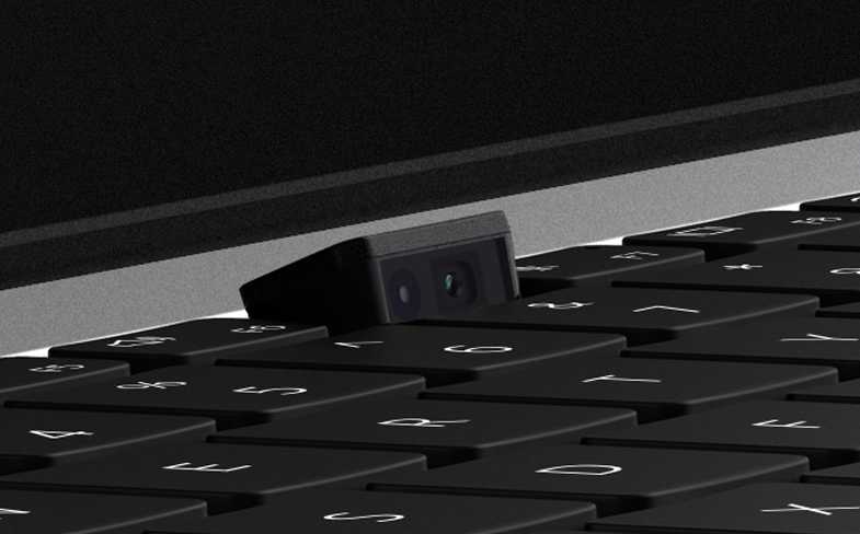 隱藏式視像鏡頭依舊置於鍵盤,不使用時可以收起來。 隱藏式視像鏡頭依舊置於鍵盤,不使用時可以收起來。