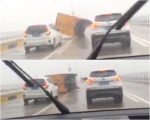 強颱將貨車吹翻。網圖