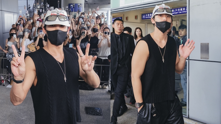 MINGYU黑背心電力眼神襲港 爆肌型男大派心心再舉V字手勢 數百Carat提前霸位逼爆機場。