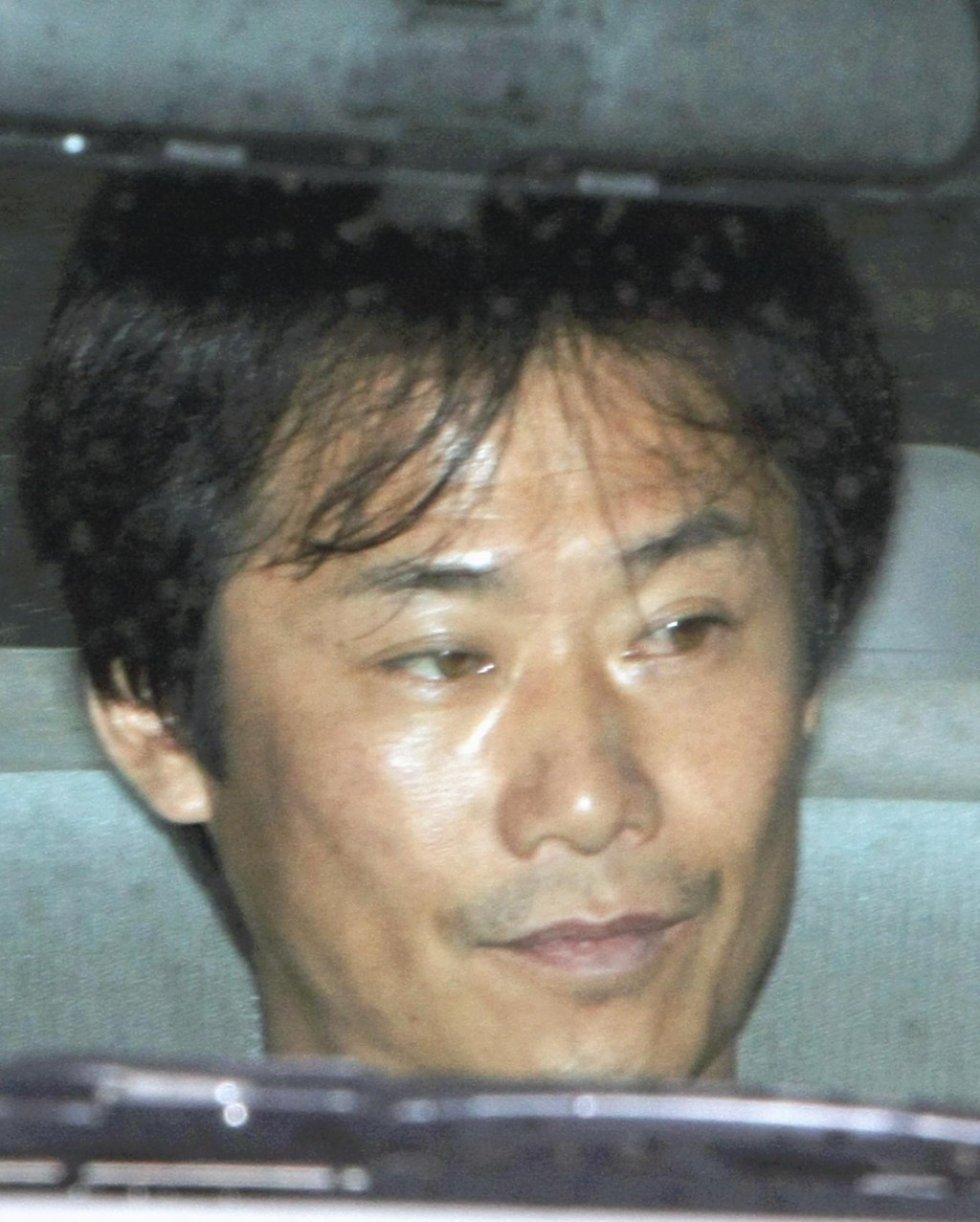 高見素直在案發翌日自首被捕。 法新社 高見素直在案發翌日自首被捕。 法新社