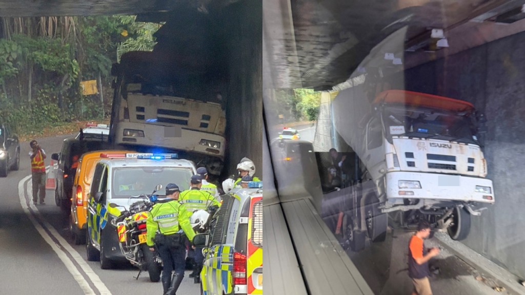 香港仔吊臂车硬撼隧道顶 车头凌空铲起