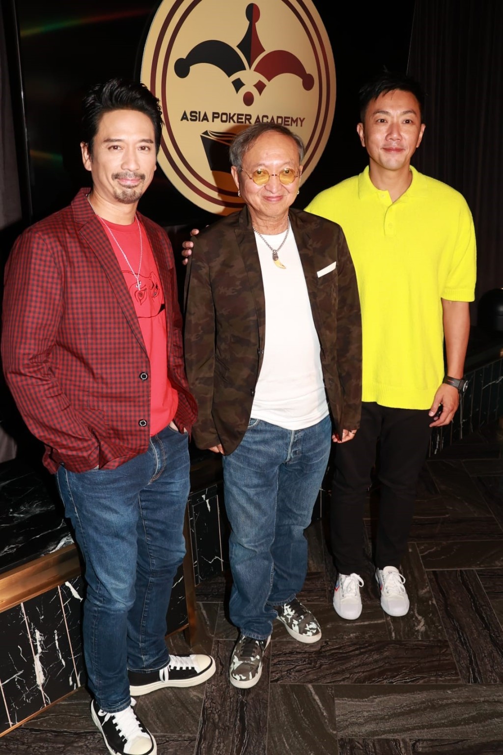 同場仲有黃柏高(中)。