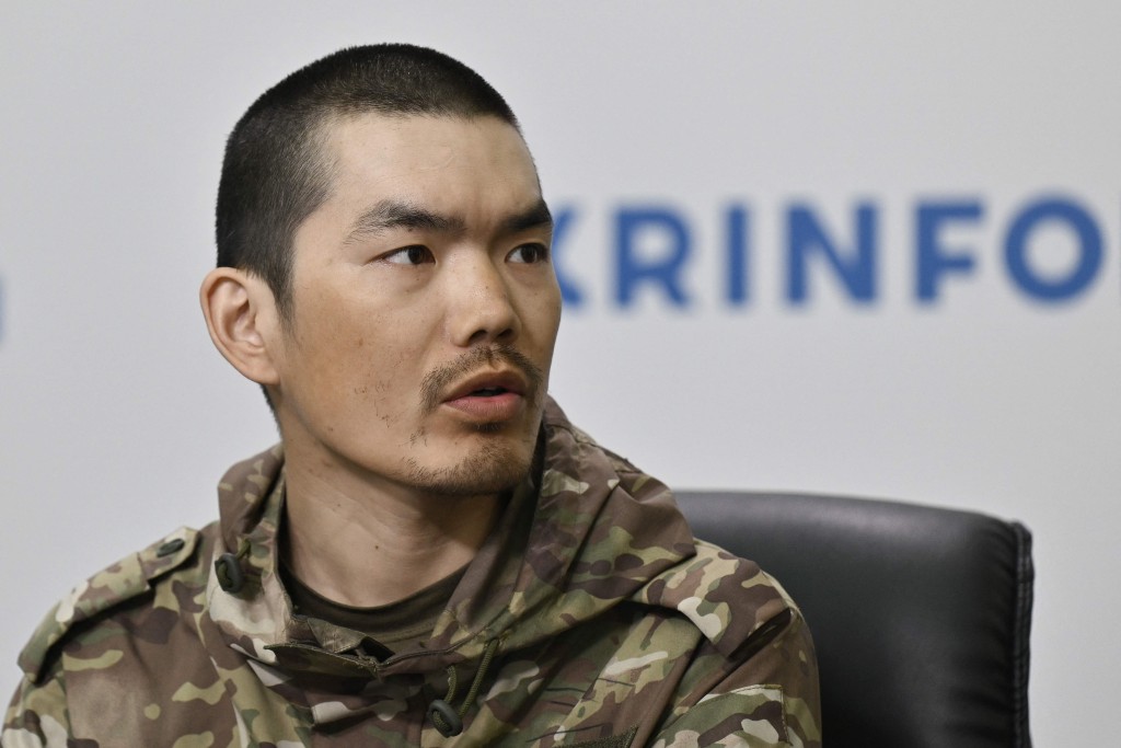王廣軍來自河南。法新社