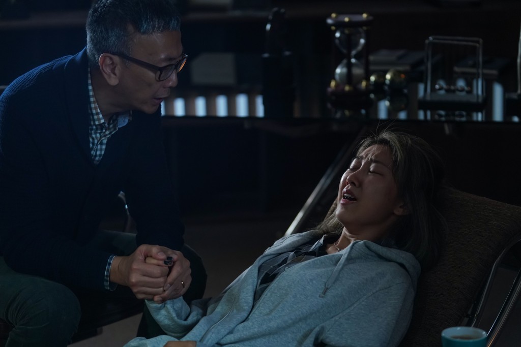 片中阿旦幫她捉「鬼」。