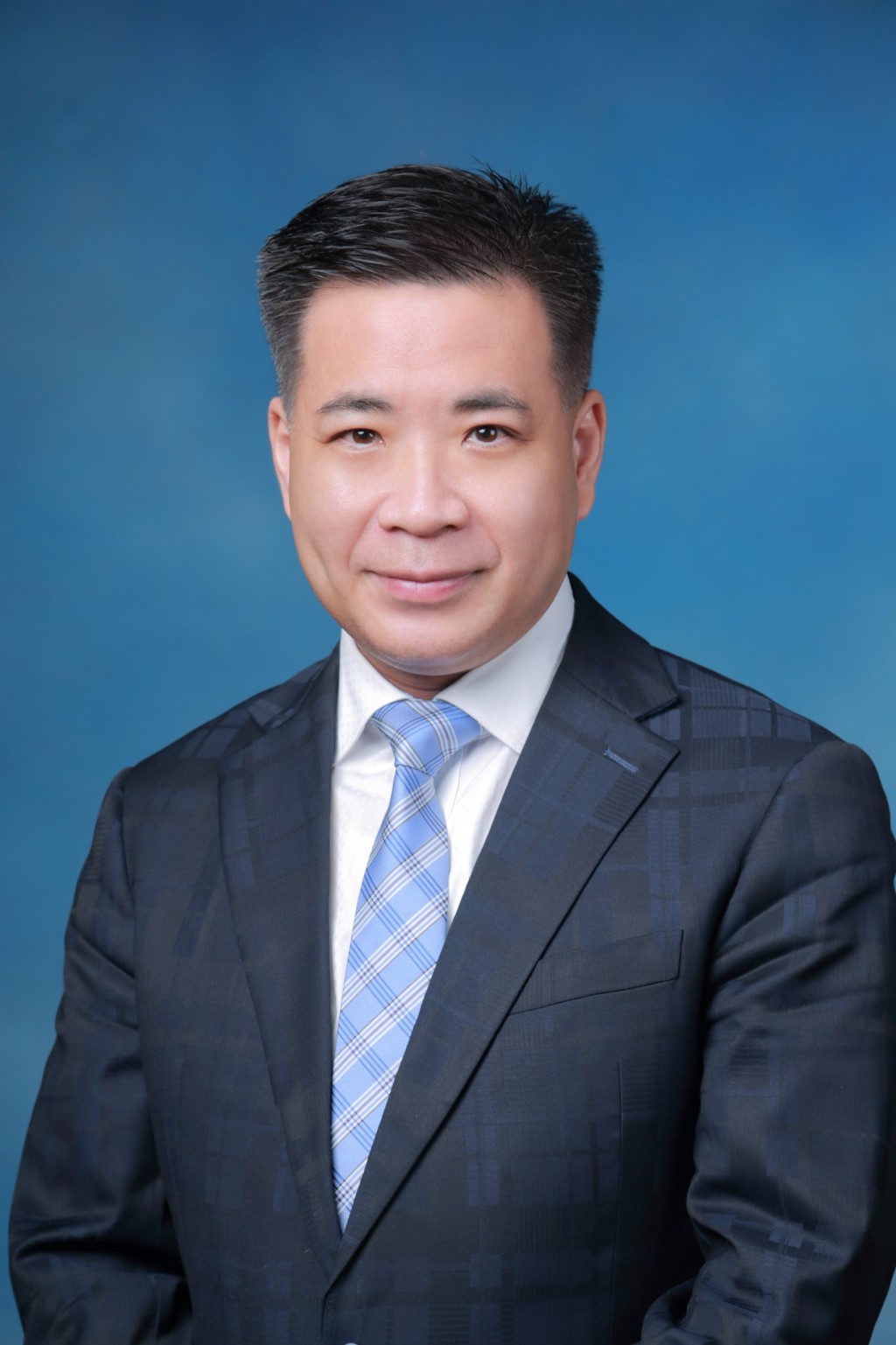 香港佛教聯合會會屬小學校長會主席、佛教林金殿紀念小學吳永雄校長（圖片來源：受訪者提供）