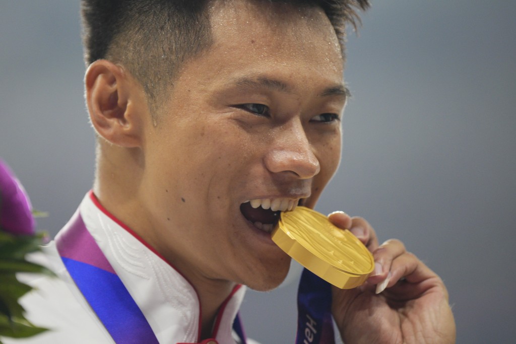 杭州亞運，謝震業奪100米跑金牌。 AP