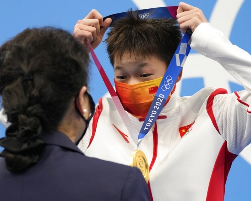 全紅嬋奪金後，有望獲得一筆獎金助母治病。AP圖