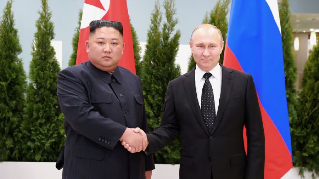 金正恩(左)在俄羅斯與普京會面。路透社