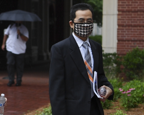 胡安明被判無罪，美國司法部稱對結果失望。美聯社圖片