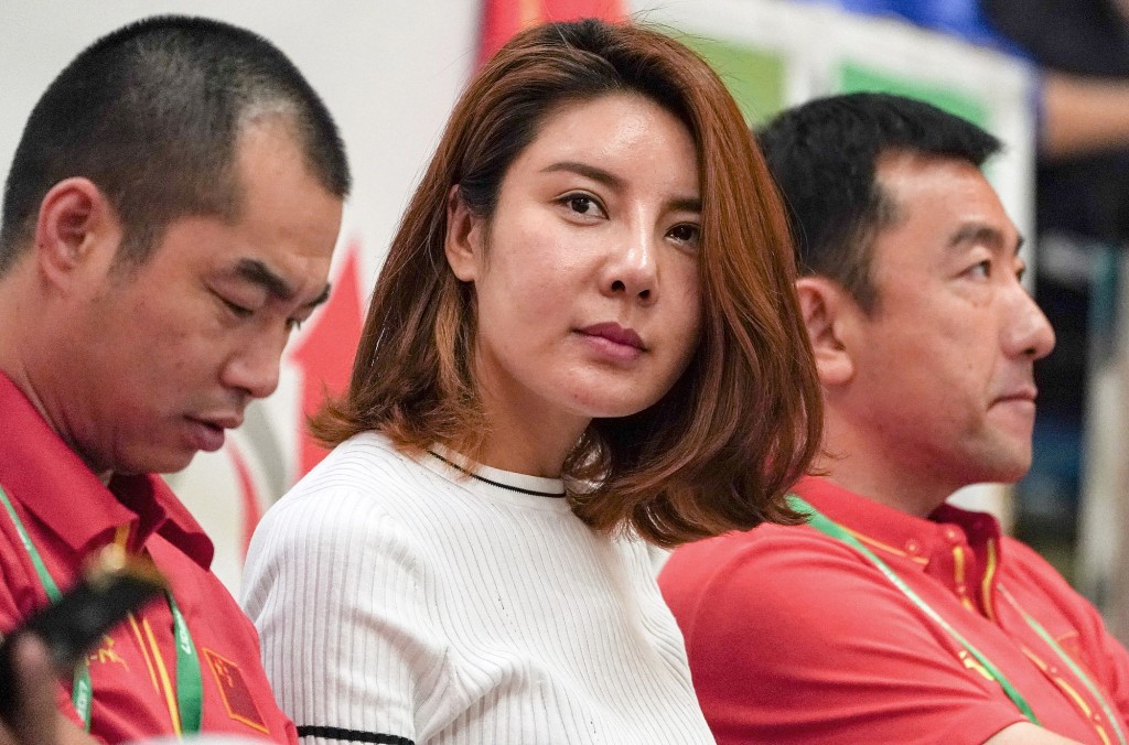 杜麗（中）看到愛徒封王，感覺比自己在○四雅典奧運摘金更開心。資料圖片