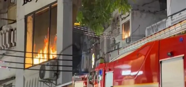 廣州商店二樓窗戶以LED大屏幕播「動態火焰」。 廣州商店二樓窗戶以LED大屏幕播「動態火焰」。